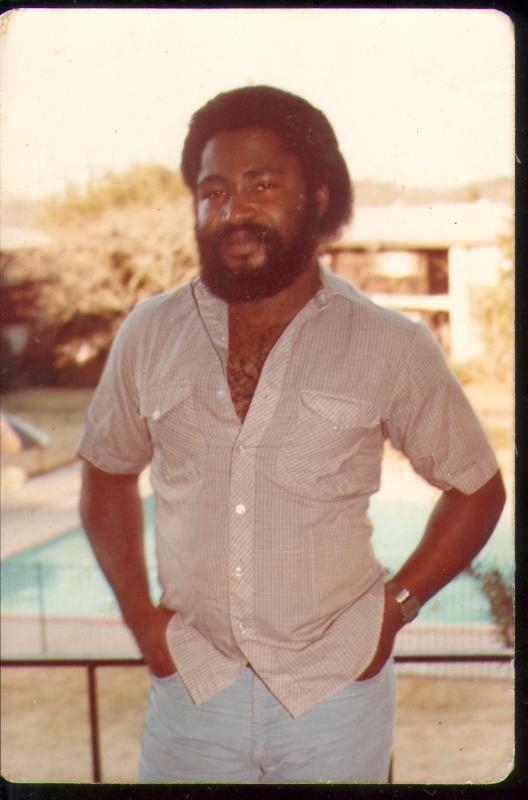 Mr. Ume standing on the balcony of his apartment in Austin, Texas, Summer 1979